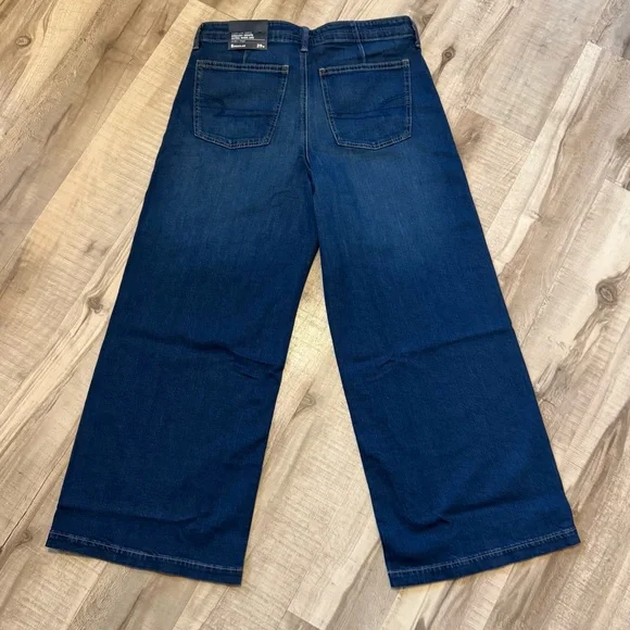 Women’s American Eagle Dreamy Drape Strigid Low Rise Ultra Wide-Leg Jeans - Picture 6 of 8